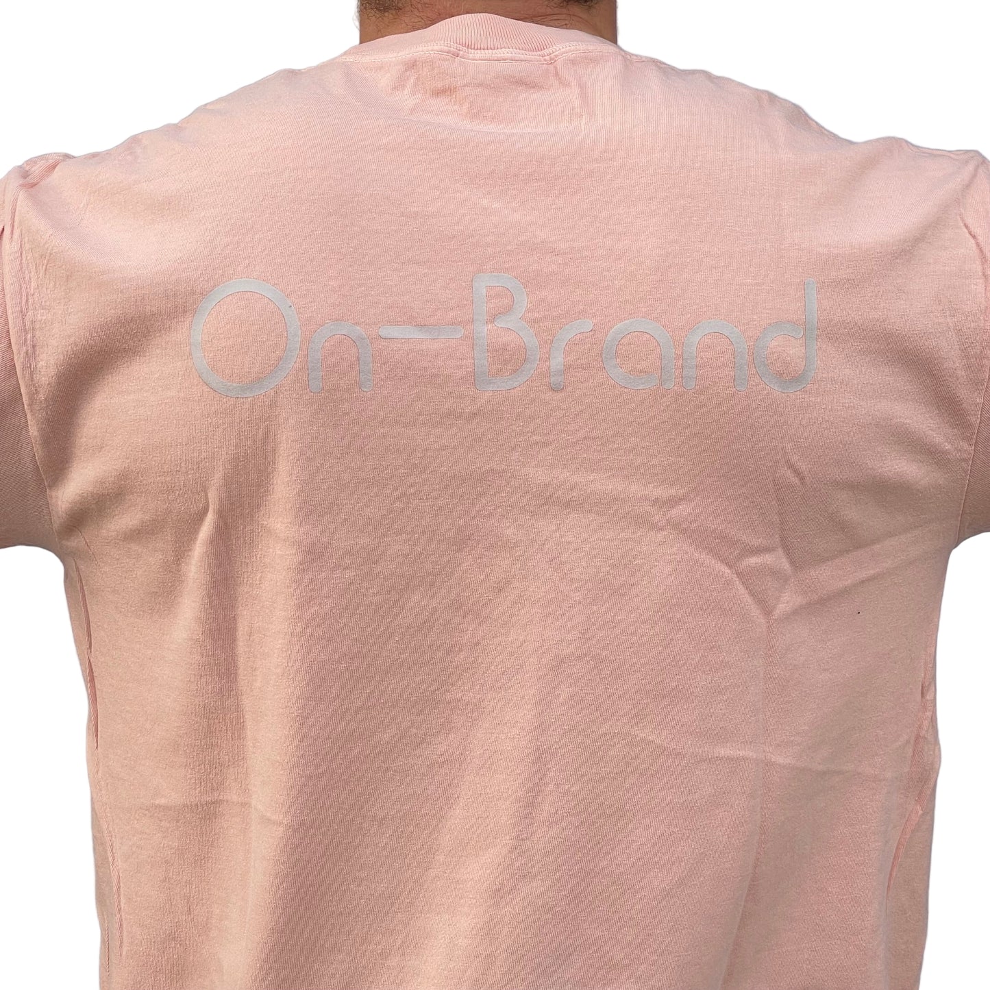 peach t-shirt with 'On-Brand' text on the back 