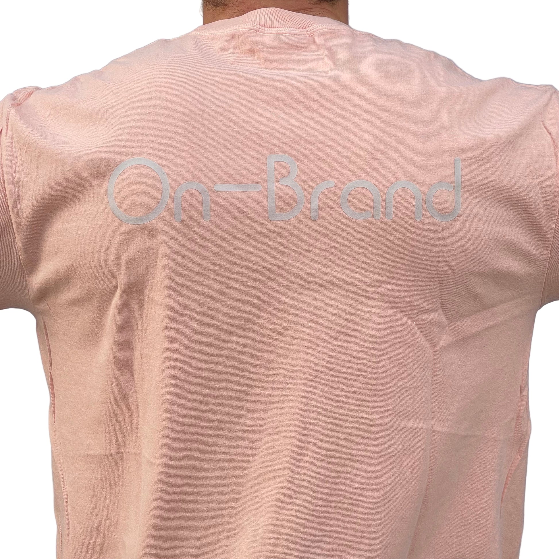 peach t-shirt with 'On-Brand' text on the back 