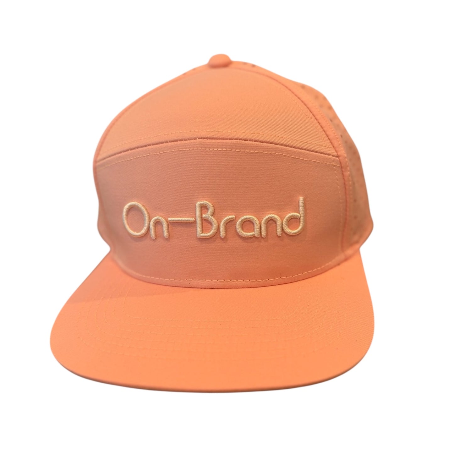 Peach On-Brand Golf cap with raised On-Brand wordmark embroidery