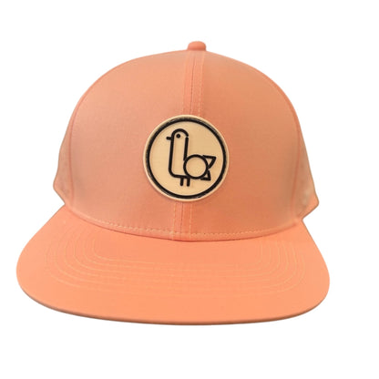 Peach On-Brand Golf cap with circular rubber seagull patch