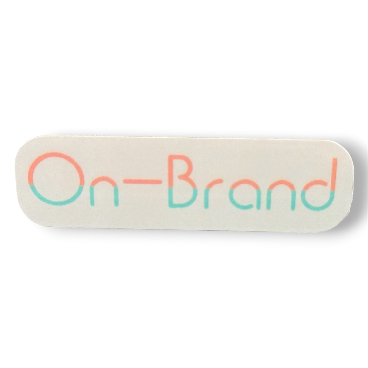 Rectangular cream sticker with 'On-Brand' text in peach and seafoam letters on a white background