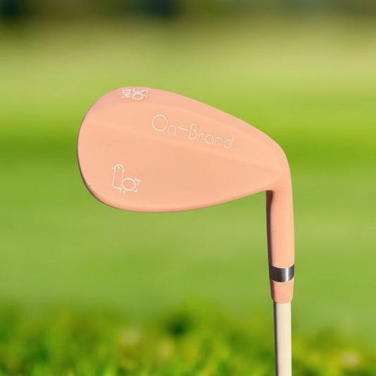Peach Phoenix Wedge by On-Brand Golf isolated on a clean studio background
