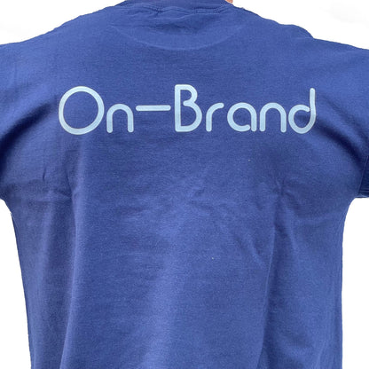 On-Brand Golf navy t-shirt back, close-up of light blue On-Brand wordmark print