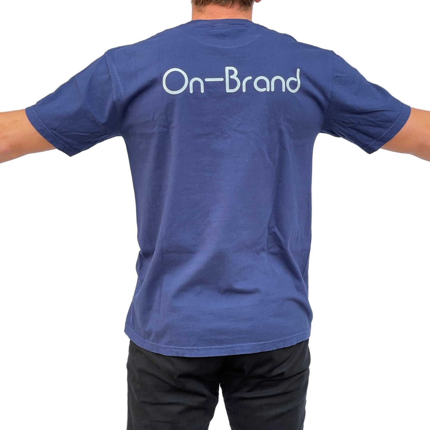 On-Brand Golf navy t-shirt back view on model with light blue On-Brand wordmark print