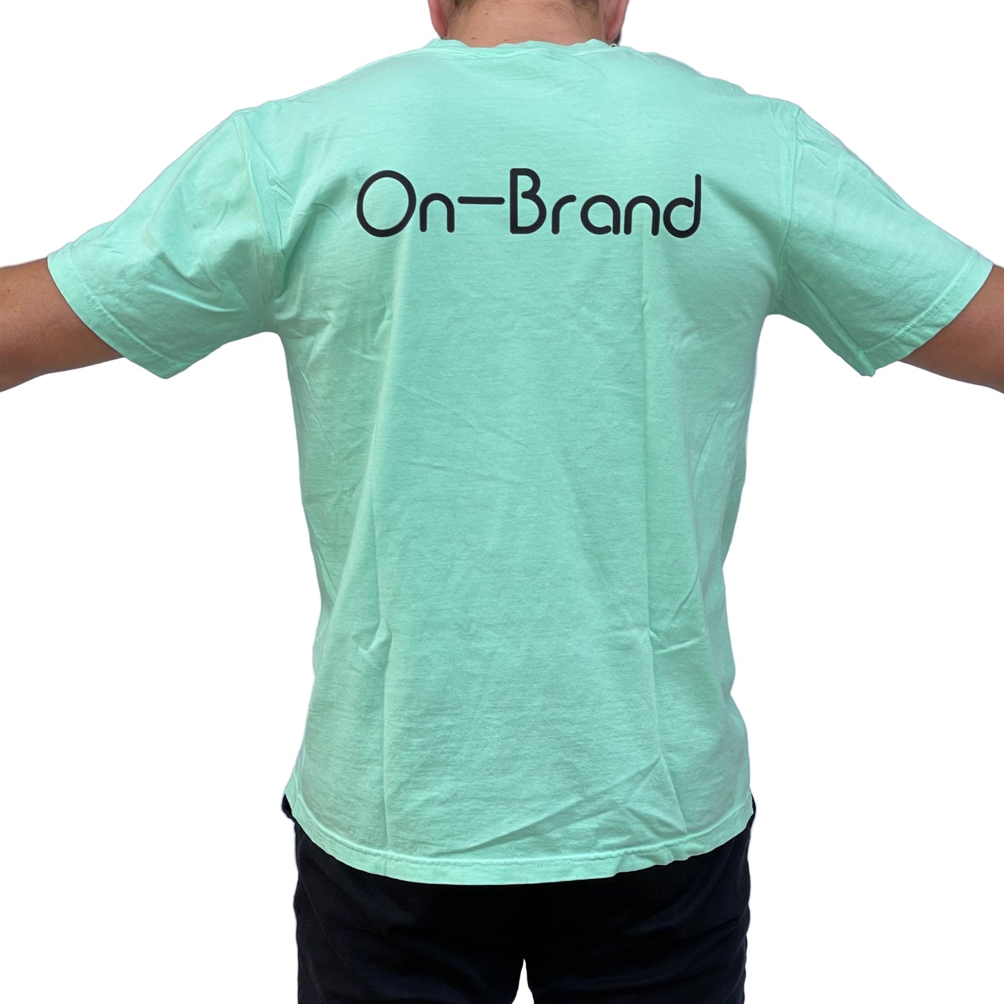 On-Brand Golf seafoam t-shirt back view on model with black On-Brand wordmark print