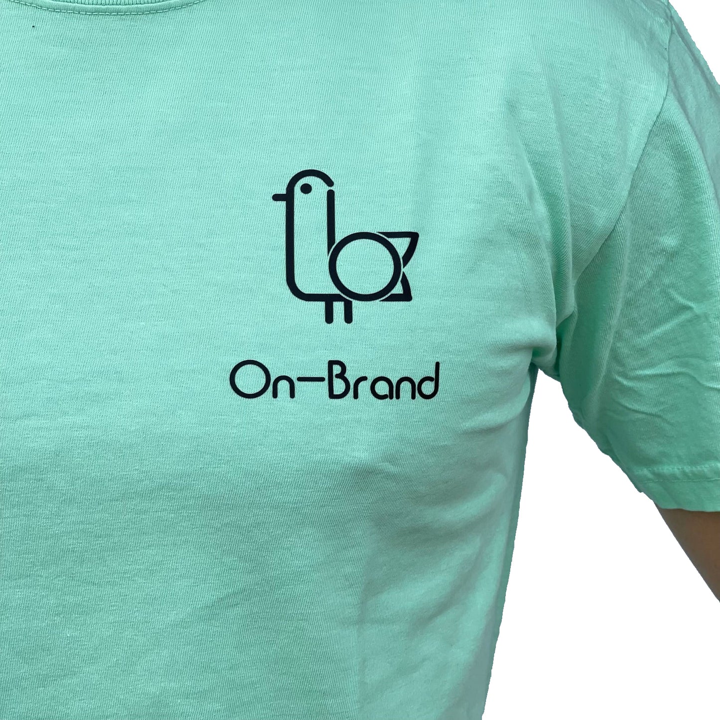 On-Brand Golf seafoam t-shirt front, close-up of black seagull and On-Brand chest print