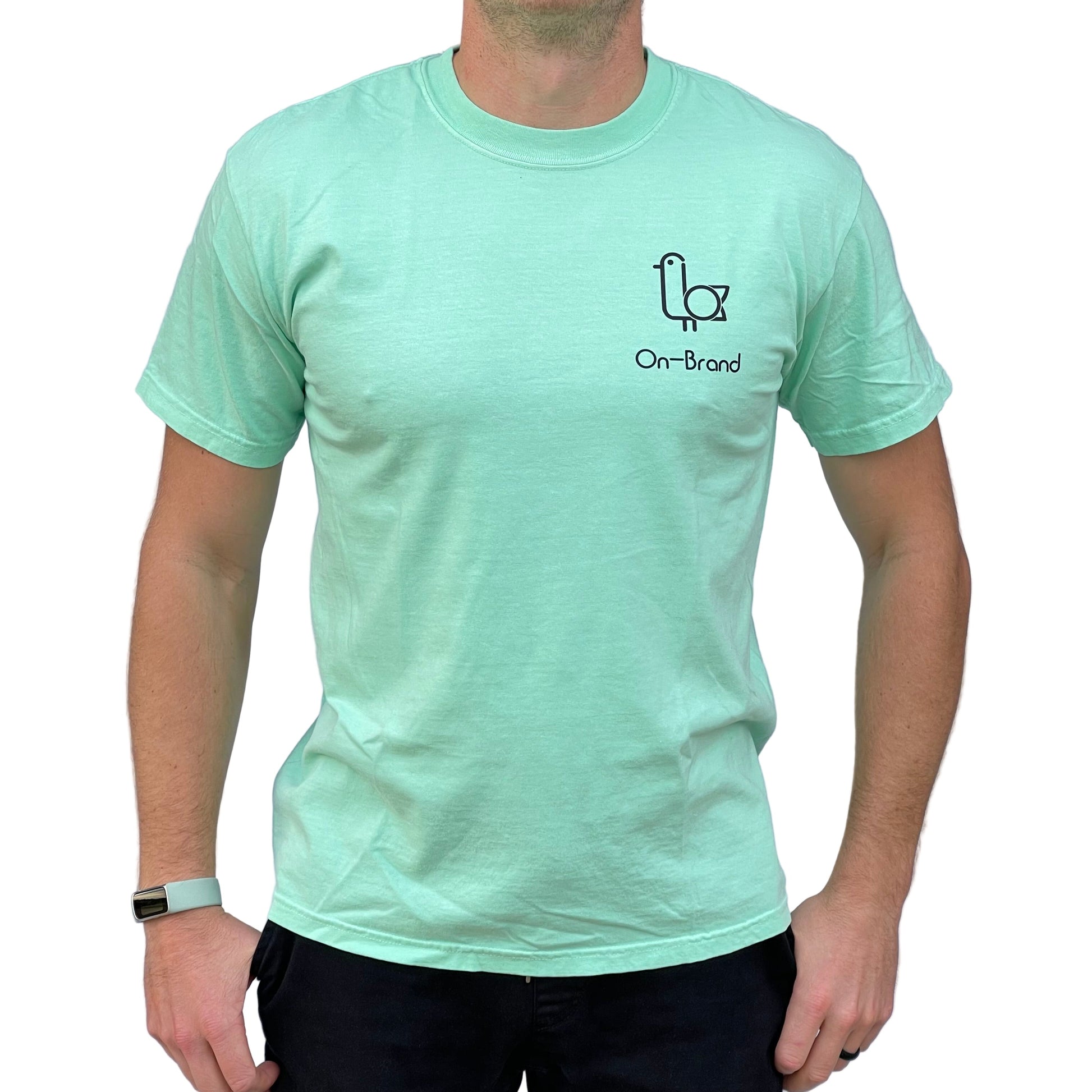 On-Brand Golf seafoam t-shirt front view on model with seagull and On-Brand chest print