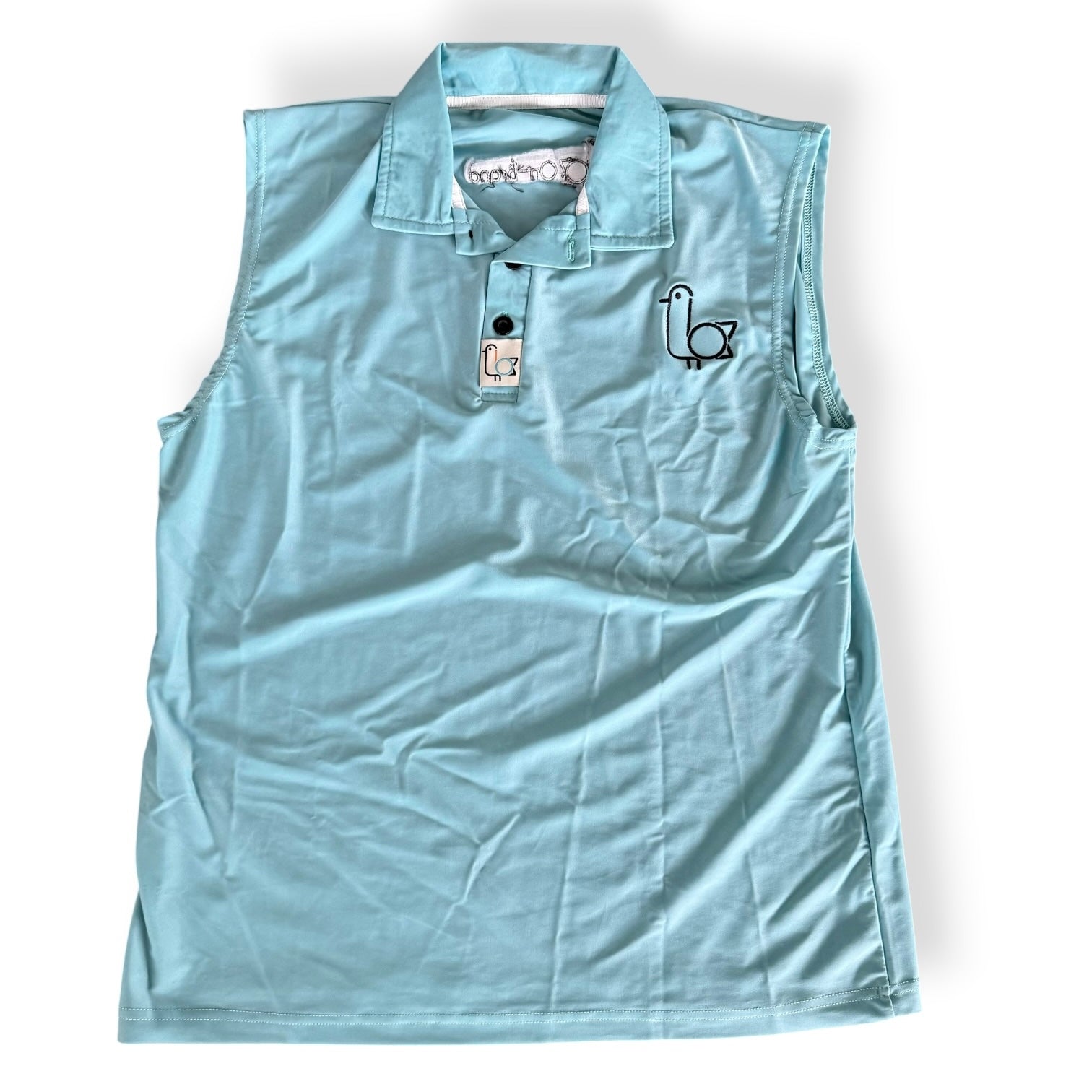 Sleeveless women's golf polo in light seafoam, front view – On-Brand Golf